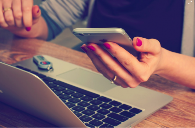 Woman holding a phone