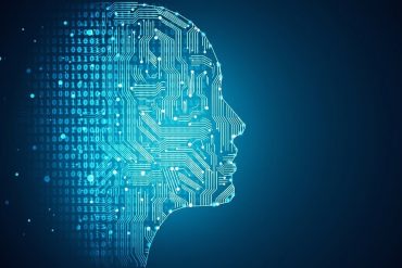 artist's rendering of artificial intelligence. a silhouette of a human facial profile with nodes representing ai. computer generated image in a blue colour