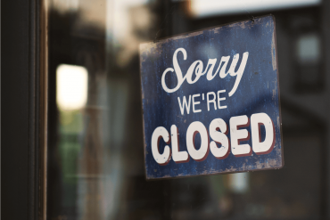 Sorry we're closed store sign