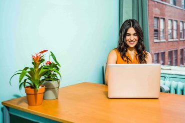 Woman on laptop at home