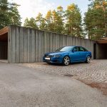 Used car in front of house