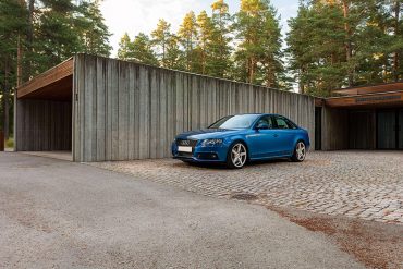 Used car in front of house