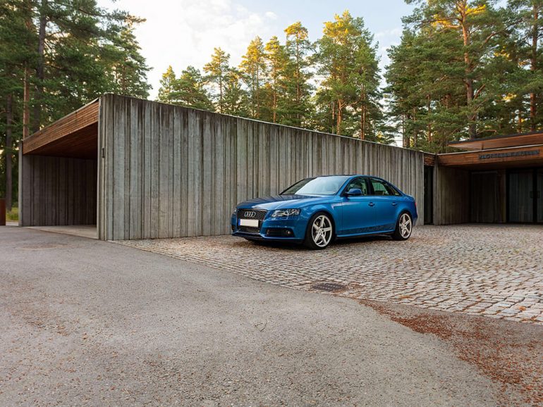 Used car in front of house