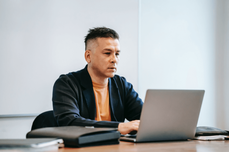 Purpose Financial entrepreneur using laptop