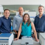 AbCellera's leadership team in a company lab