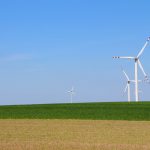 Wind turbines in an open field
