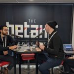 Anthony Mouchantaf sitting across Douglas Soltys while they record the BetaKit podcast.