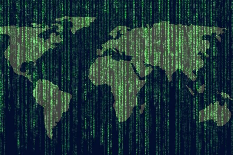 Geometry of the world map with a layer of green binary code on top.