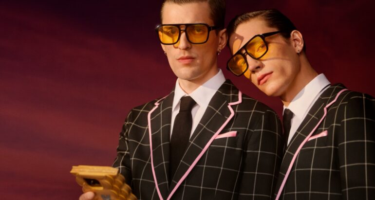 Two men wearing glasses