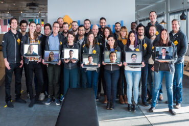 Busbud team posing for a photo