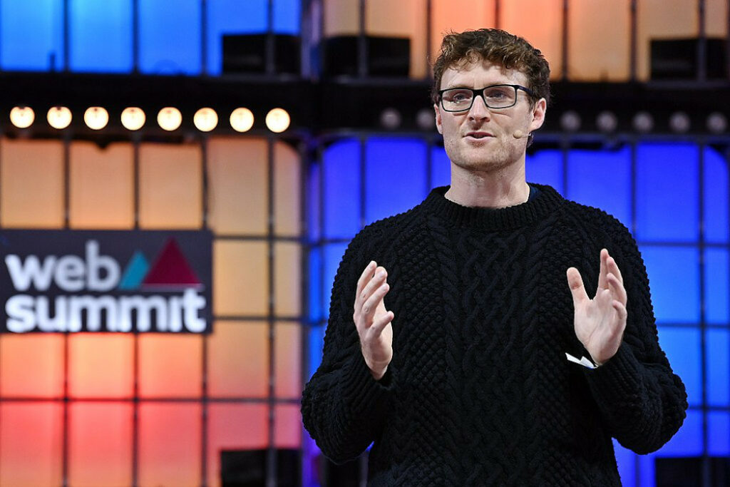 Paddy Cosgrave at Web Summit | BetaKit Paddy Cosgrave speaking at Web Summit 2022.