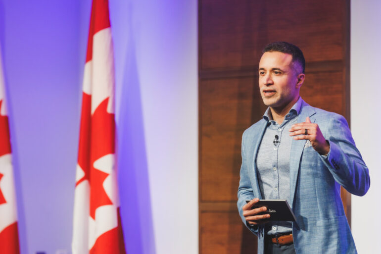 NACO CEO Claudio Rojas speaking at a 2023 event.