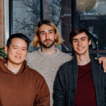 Cohere's three co-founders posing for a picture.