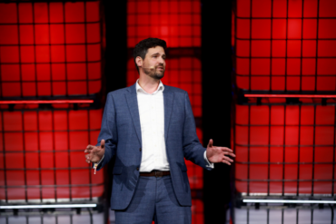 Immigration minister Sean Fraser on stage at Collision