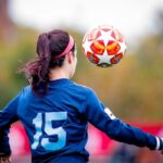 Young woman playing soccer