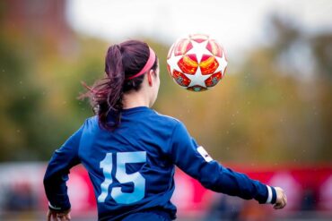 Young woman playing soccer