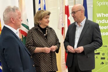 ACOA Minister Gudie Hutchings (center) with Springboard Board Chair Mike Maguire (left), and Springboard president and CEO Daryl Genge (right).