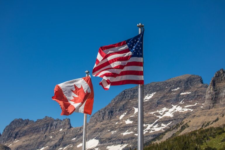 US flag and Canadian flag