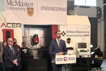 Ontario Minister of Colleges Nolan Quinn announcing a STEM investment at McMaster University.