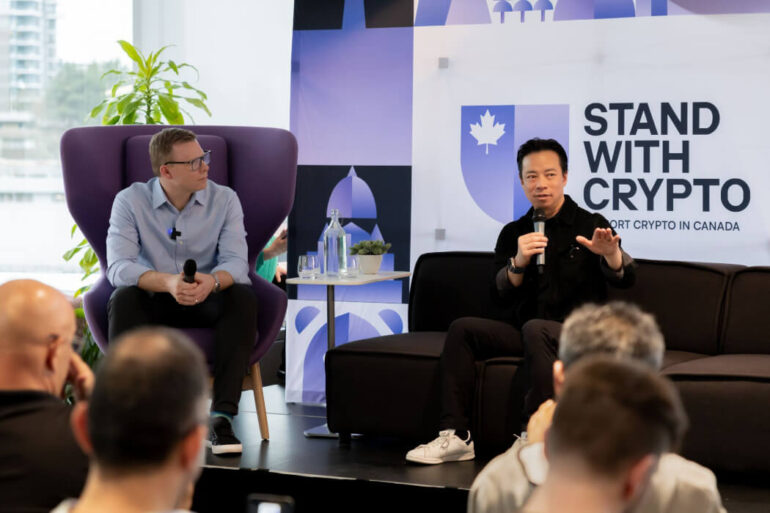 Coinbase Canada CEO Lucas Matheson (left) and Vancouver Mayor Ken Sim