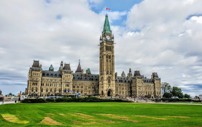 daytime view of parliament building with construction out front