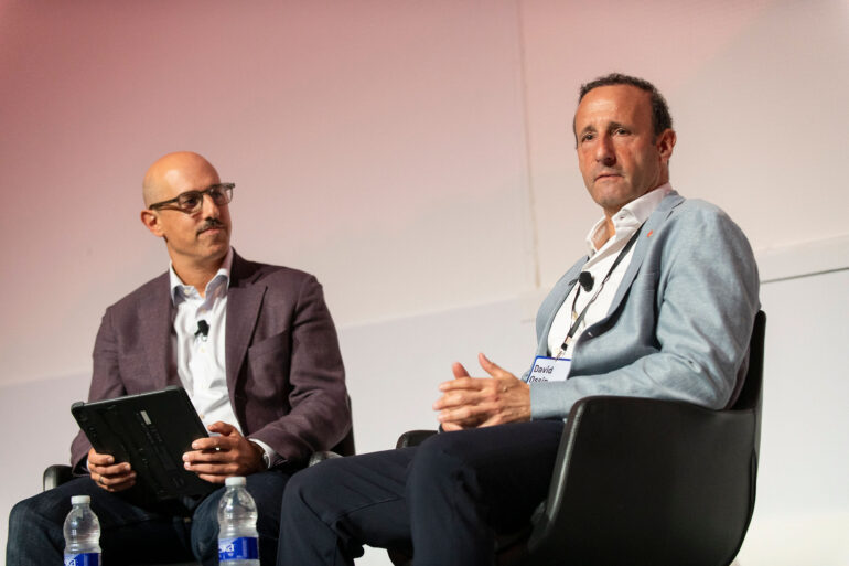 David Ossip and David Rozin onstage during a fireside chat
