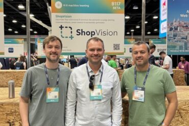 ShopVision founders Jeff Neil, Peter Sheldon, and Harry Chemko stand together at a conference.