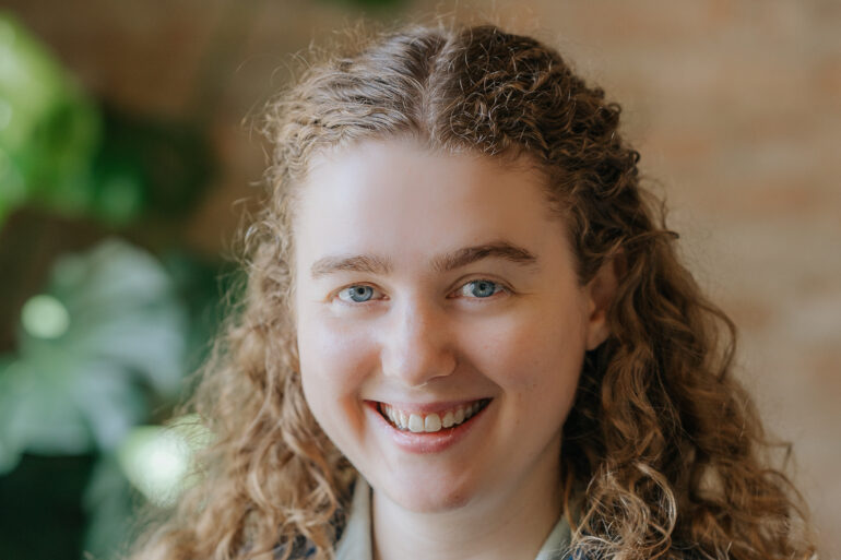 A headshot of Alex Kearney