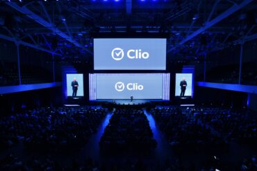 A wide shot of the ClioCon stage
