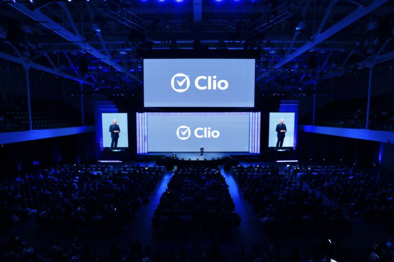 A wide shot of the ClioCon stage