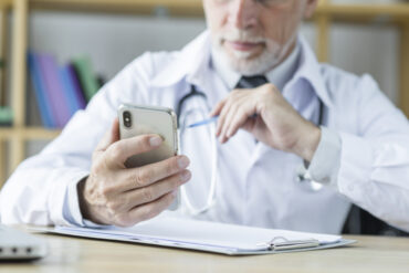A doctor using a smartphone