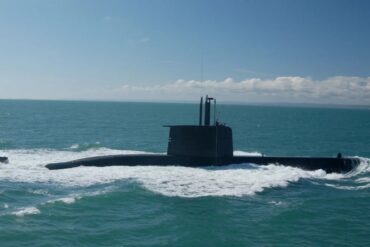 A submarine cresting out of the water