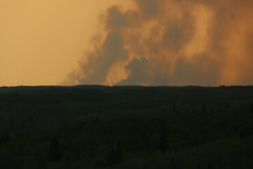 A wildfire burns in Alberta in 2023.