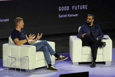 Andrew Macdonald and Satish Kanwar on stage Toronto Tech Week's Homecoming event.