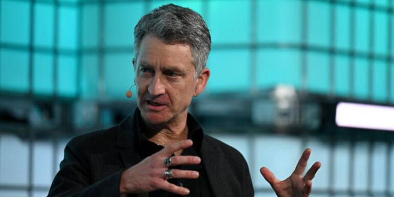 Vince Beiser on stage at Web Summit Vancouver